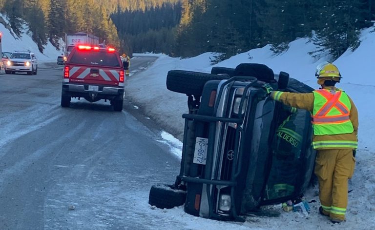 Truck rolls over near Mud Lake