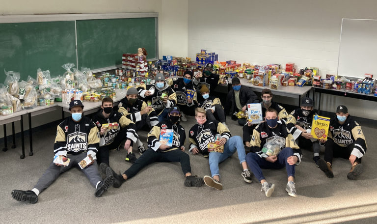 The Saints march towards community service amid a cancelled hockey season