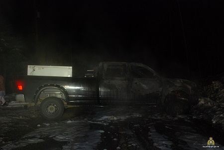 Man pushes flaming truck out of driveway to save surroundings