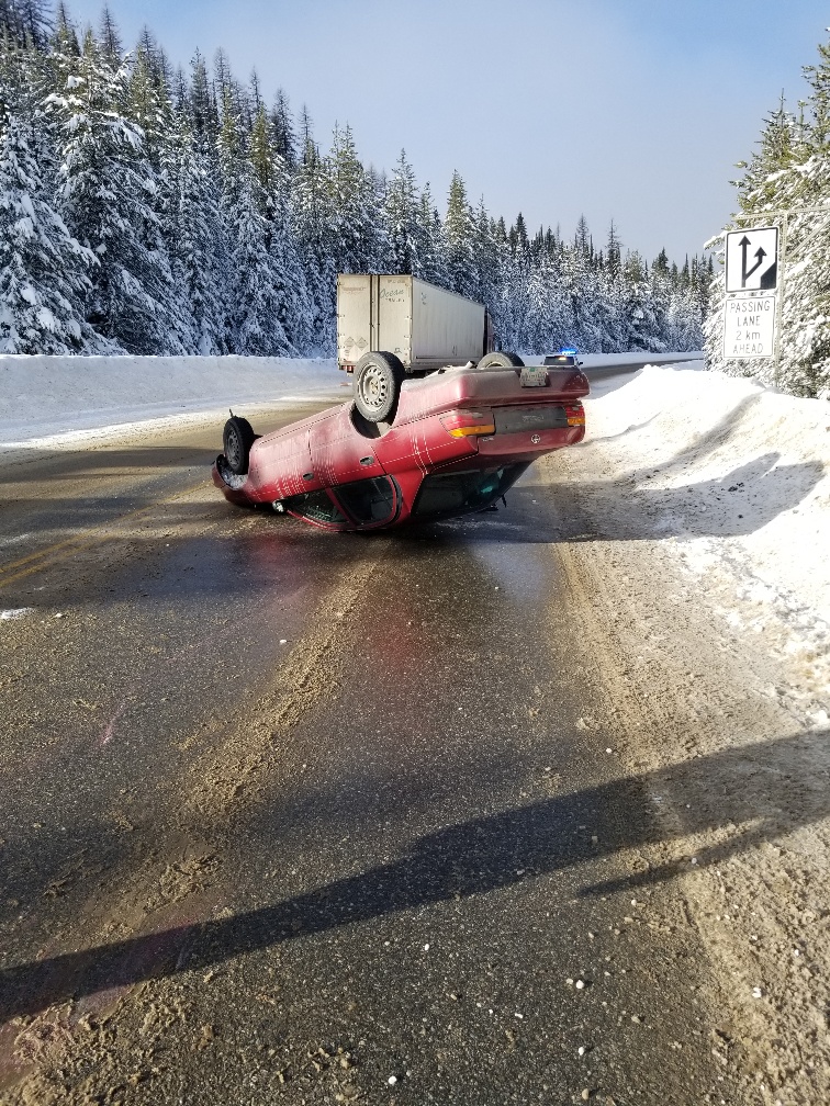 Vehicle flips near Nancy Greene Junction