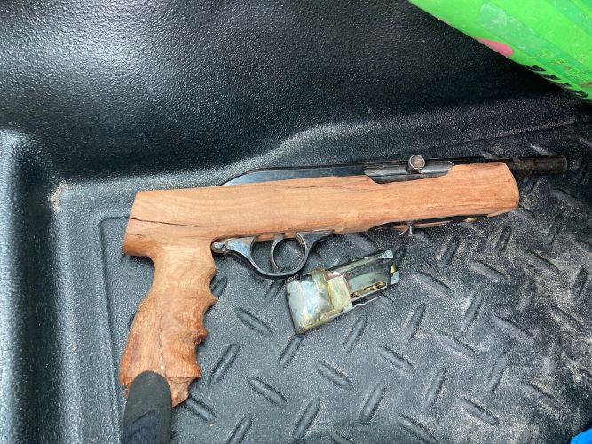 Charges pending after rifle seized in Trail