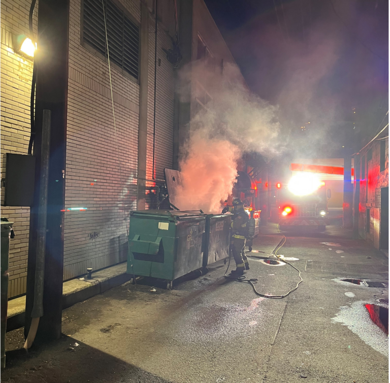 Suspicious dumpster fire put out in Trail