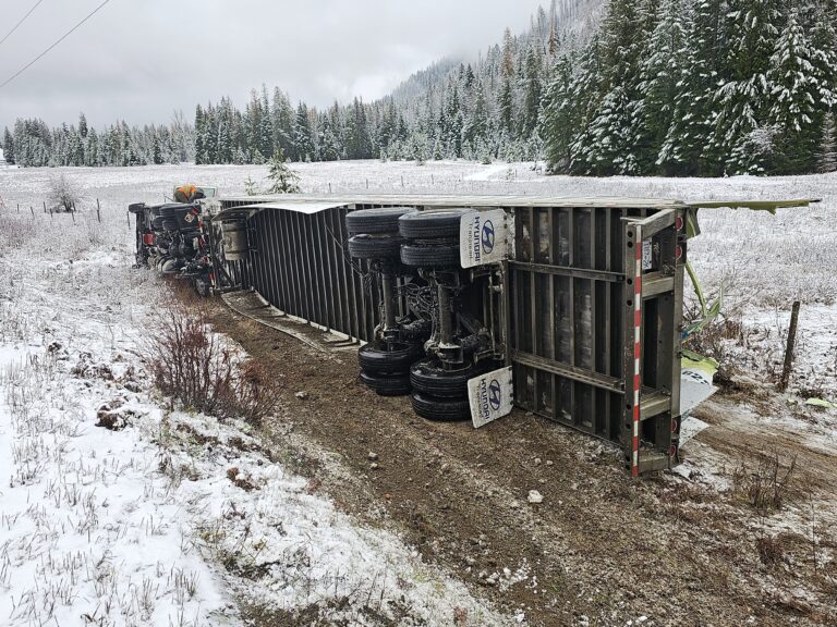 Driver ticketed after tractor-trailer flips near Fruitvale