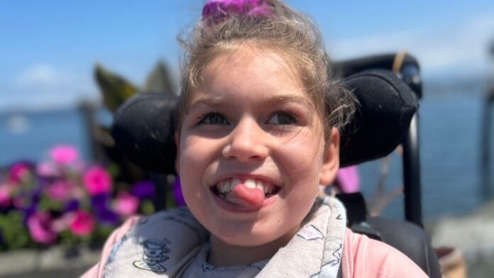Photo of Charleigh Pollock smiling.